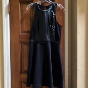 Black sleeveless dress with leather front